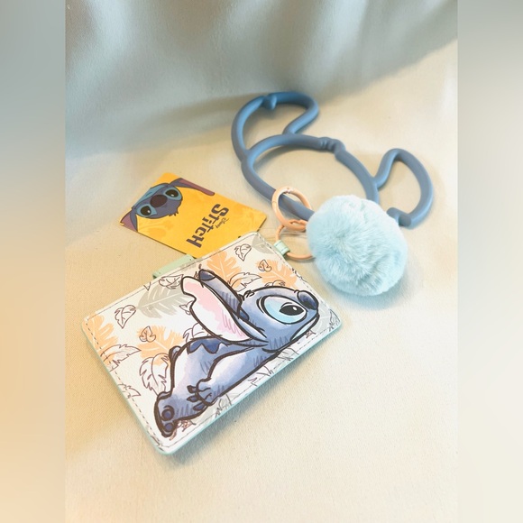 Disney Handbags - Disney Stitch Wristlet Wallet – Fun, Functional & Totally Adorable! 🌺💙